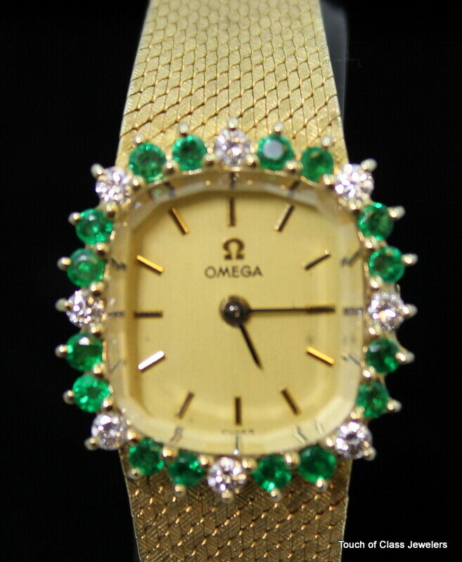 Gorgeous pre-owned Ladies Omega 14k Solid Gold Diamond & Emerald