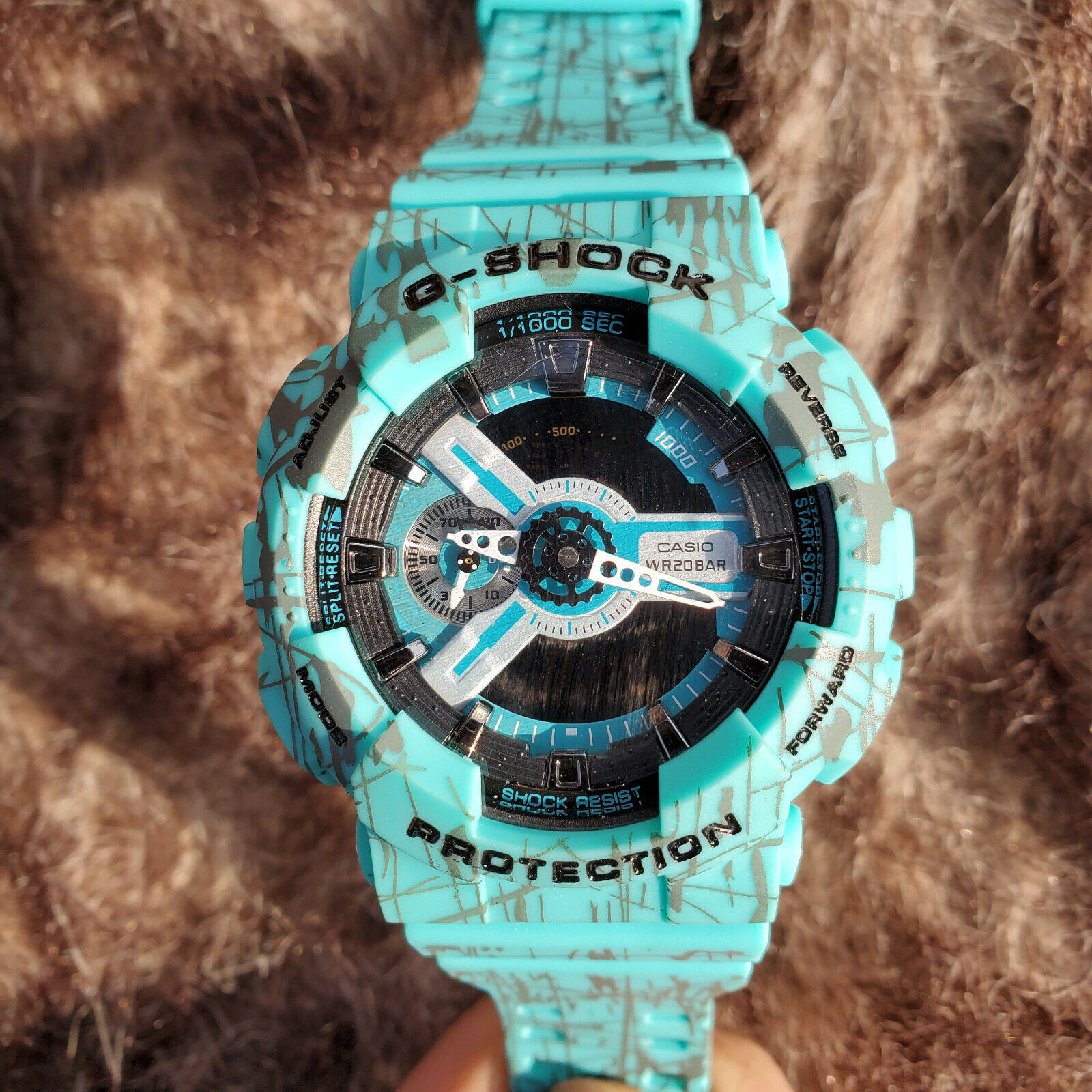 Casio Mens GA-110SL-3ACR Teal Splatter Men Watch | WatchCharts