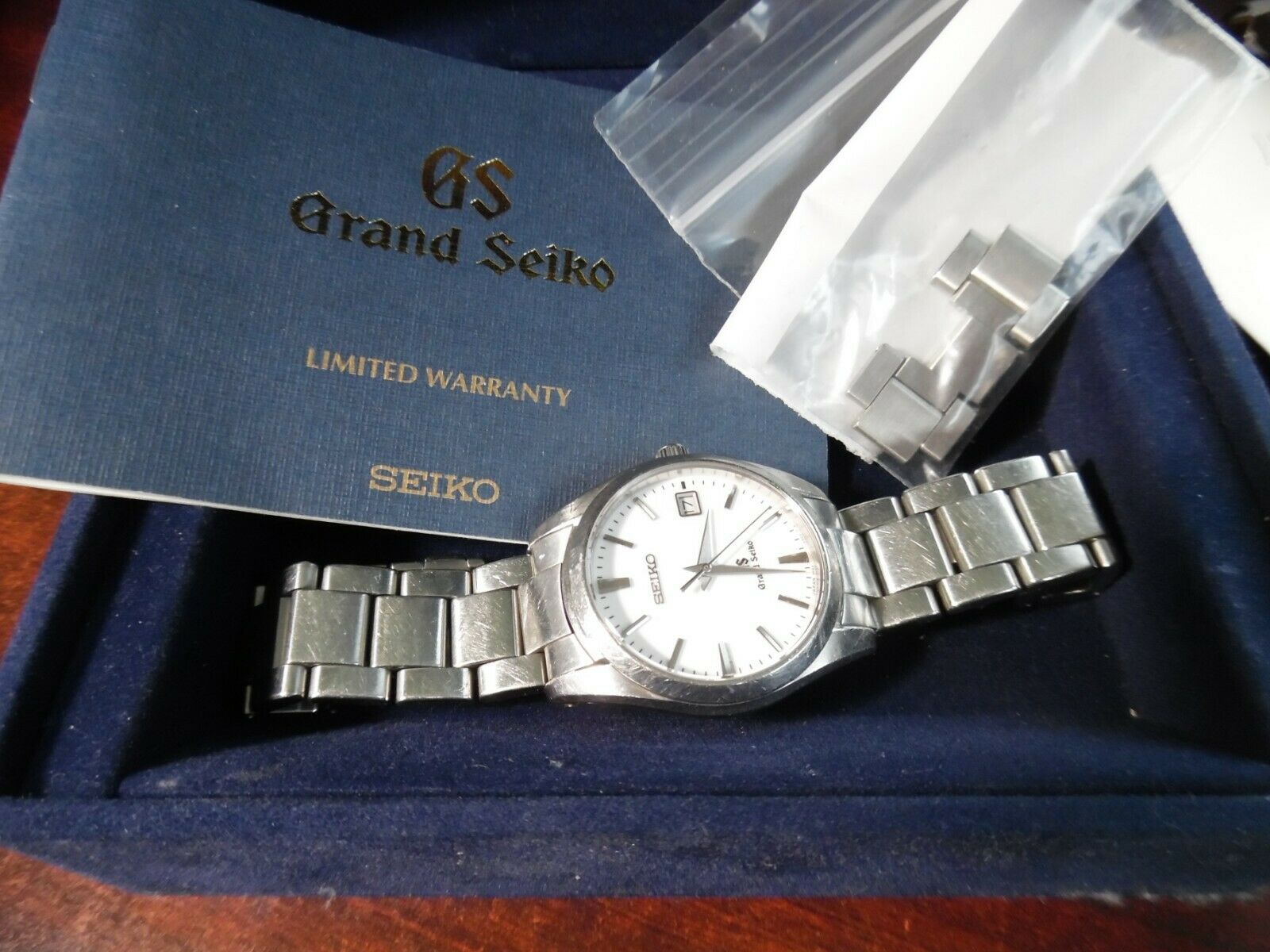 Grand Seiko sbgx053 white dial quartz mens watch | WatchCharts