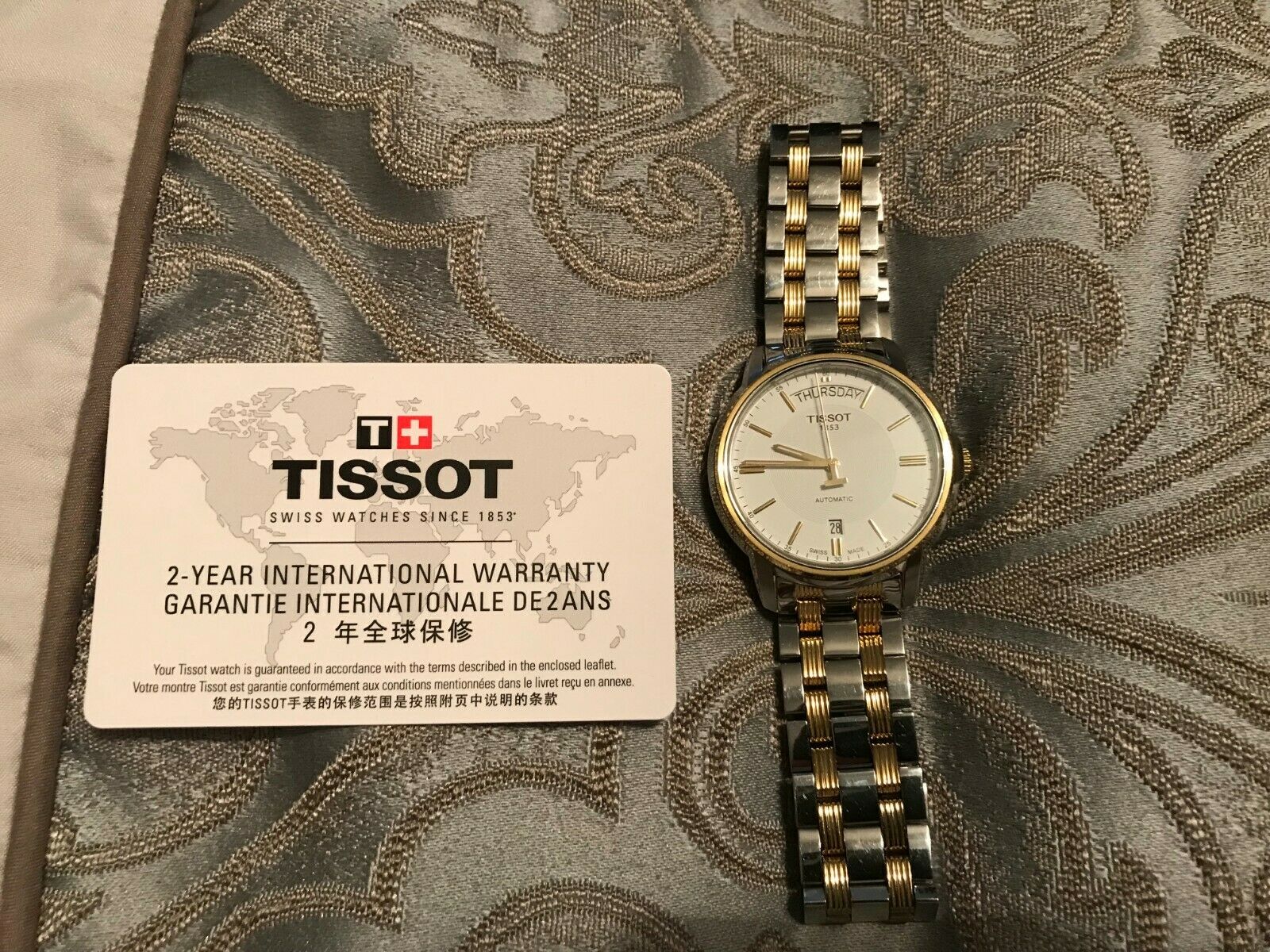 Tissot Men s automatic Swiss made watch T065930A WatchCharts