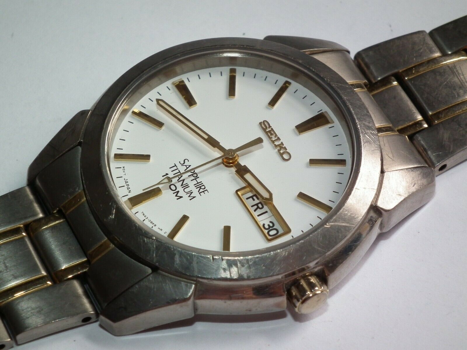 Seiko Titanium 7N43 – 0AS0 Gents 18ct & Titanium Day Date