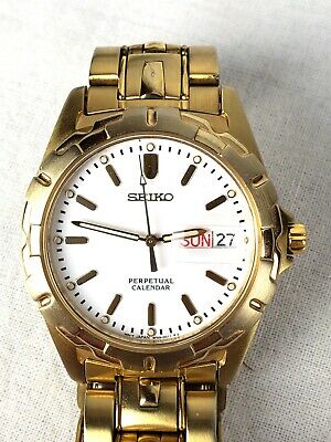 SEIKO Perpetual Calendar 8F33-0029 Day Date Gold Tone NEW BATTERY |  WatchCharts