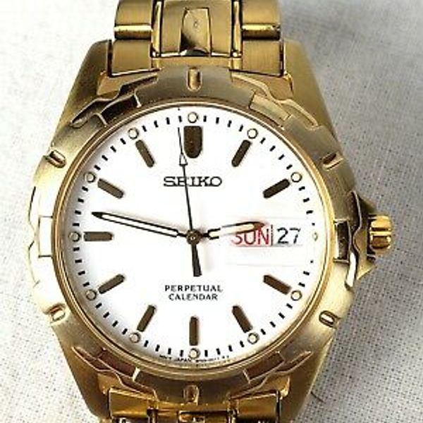 SEIKO Perpetual Calendar 8F33-0029 Day Date Gold Tone NEW BATTERY |  WatchCharts