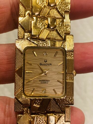 bulova water resistant 18k gold