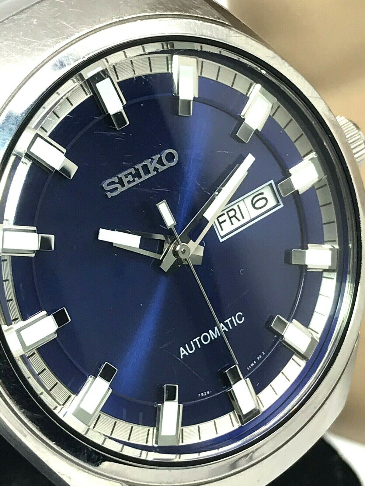 Seiko Men's Automatic SNKN41 Watch S. Steel Day Date Blue 21J 7S26-04G0  USED | WatchCharts