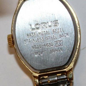 Lorus women's drees watch. Black face with gold trim. V810-6340 cheapest RO