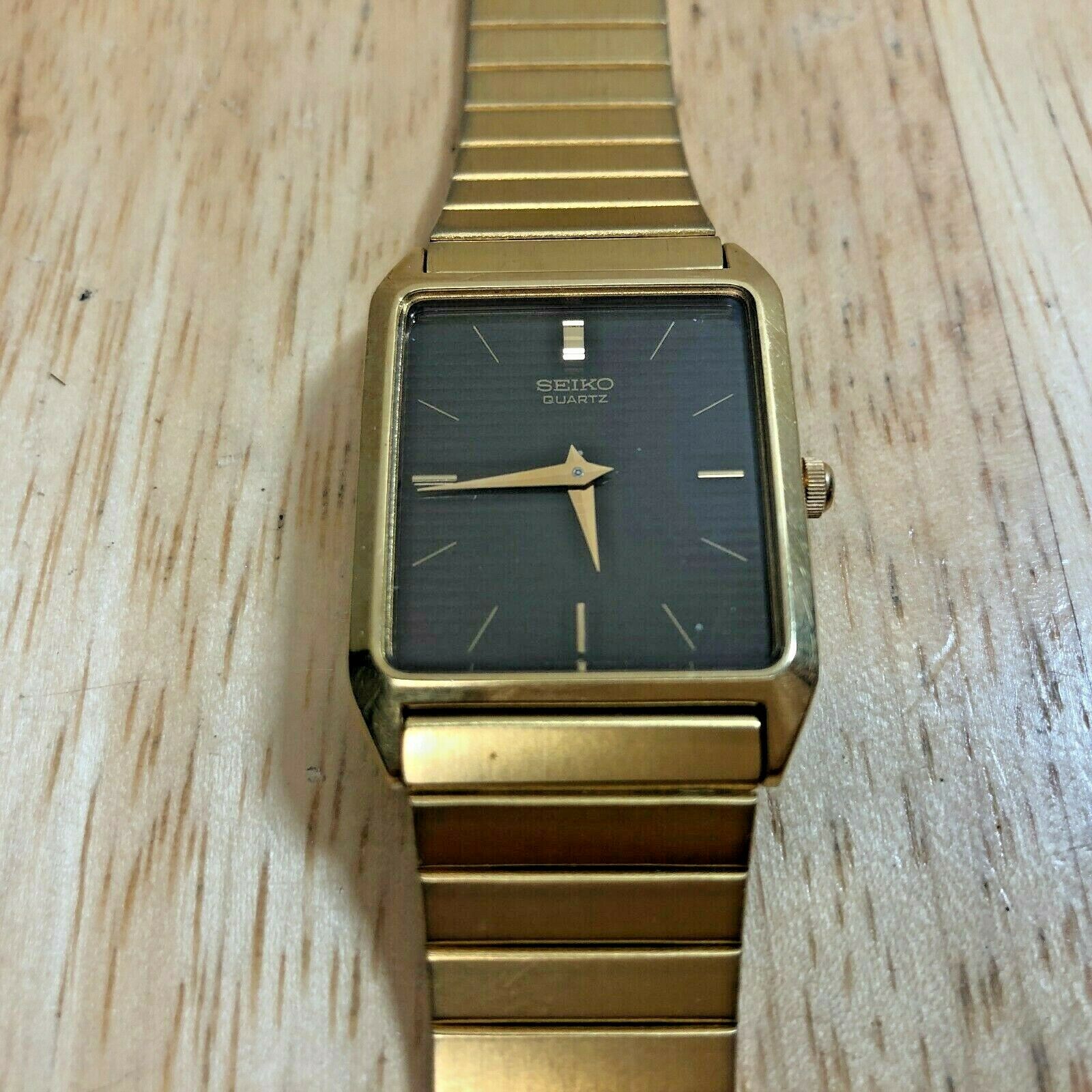 Vintage Seiko 5Y00-5000 Mens Gold Tone Rectangle Quartz Watch 