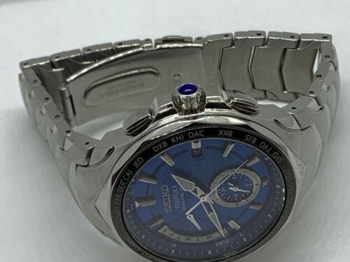 Seiko 8B63-0AK0 Men's Watch Day Date Solar Stainless Steel Silver Analog  E34 | WatchCharts