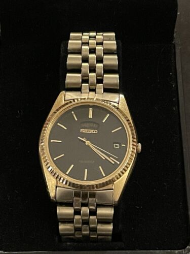 Seiko gold watch black face online