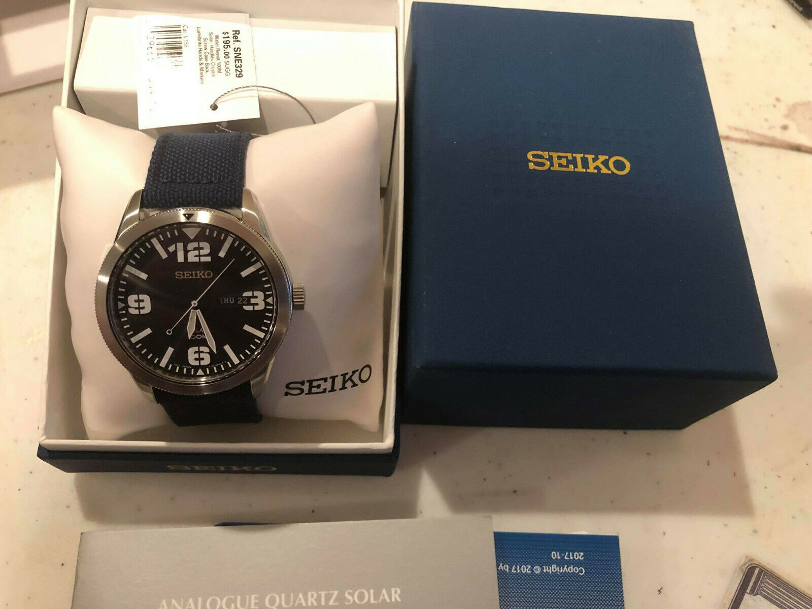 seiko solar sne329