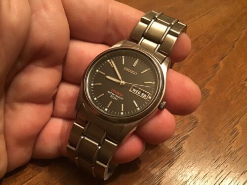 Seiko Titanium 7N43 9050 Quartz Men s Watch WR 5 BAR 50M New