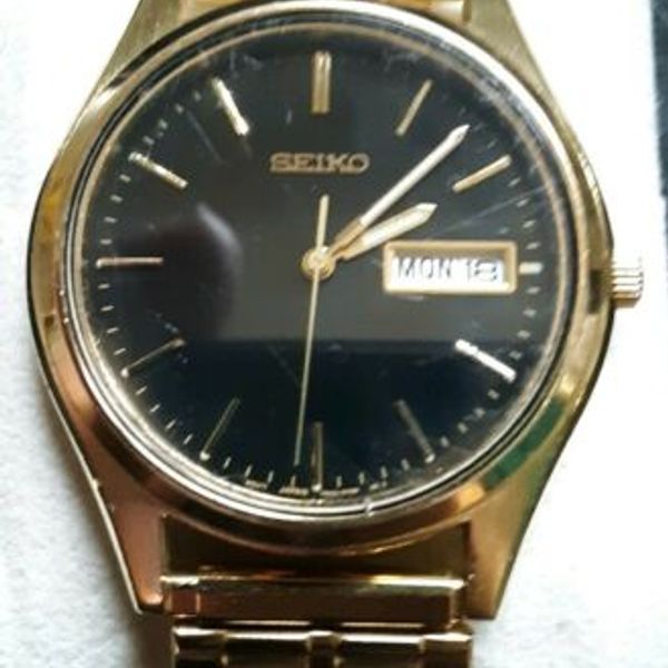 Vintage Men's Seiko Day & Date Watch 7N43-9048 A4 New Battery | WatchCharts