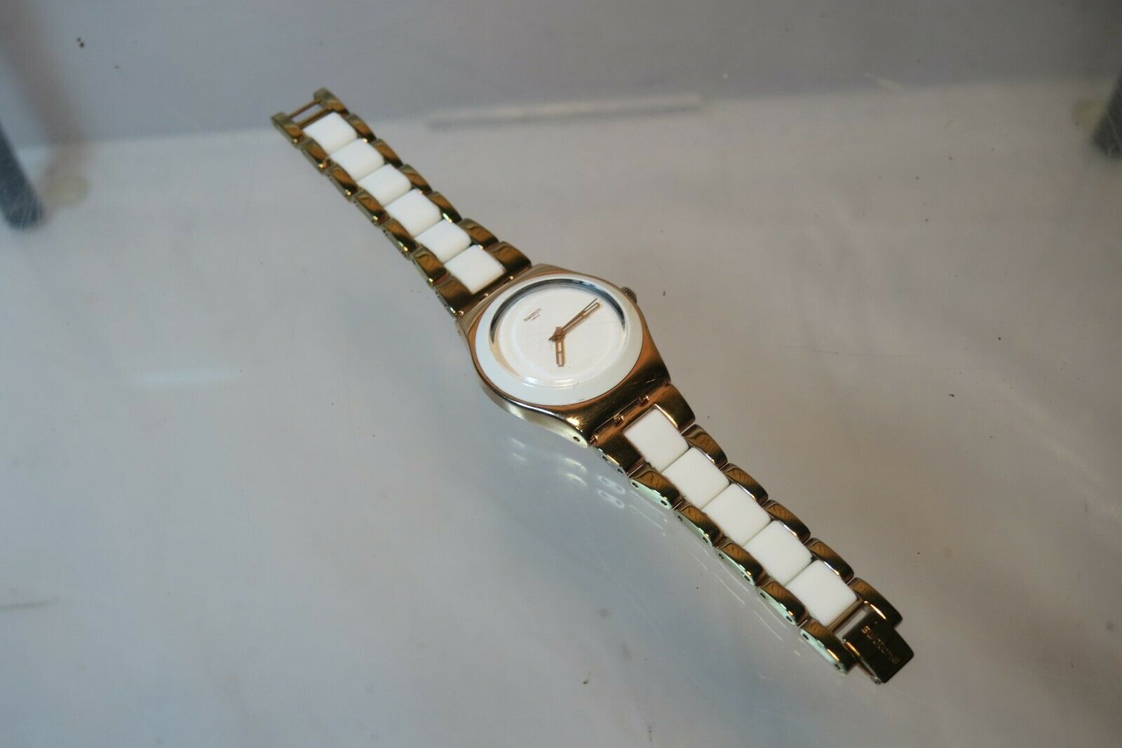 Swatch watch gold on sale color