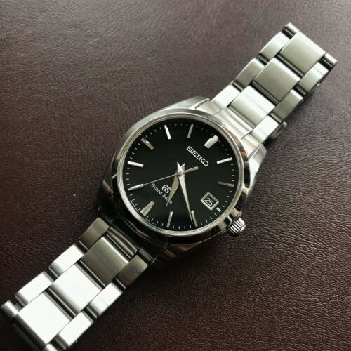Grand Seiko Sbgx061 37mm Black Dial 9f Quartz Watchcharts