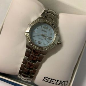 Seiko 7N82-0CG0 Women's Stainless Steel Coutura Watch Diamond Bezel |  WatchCharts