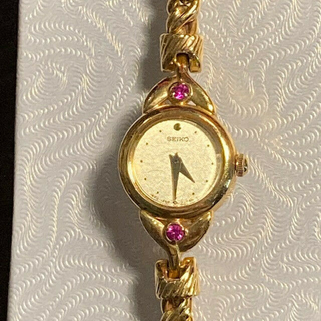 Seiko Women's Gold Plated Dress Watch White Dial 1E20-0430 with 2