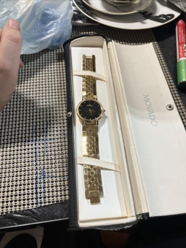 Movado faceto gold hot sale