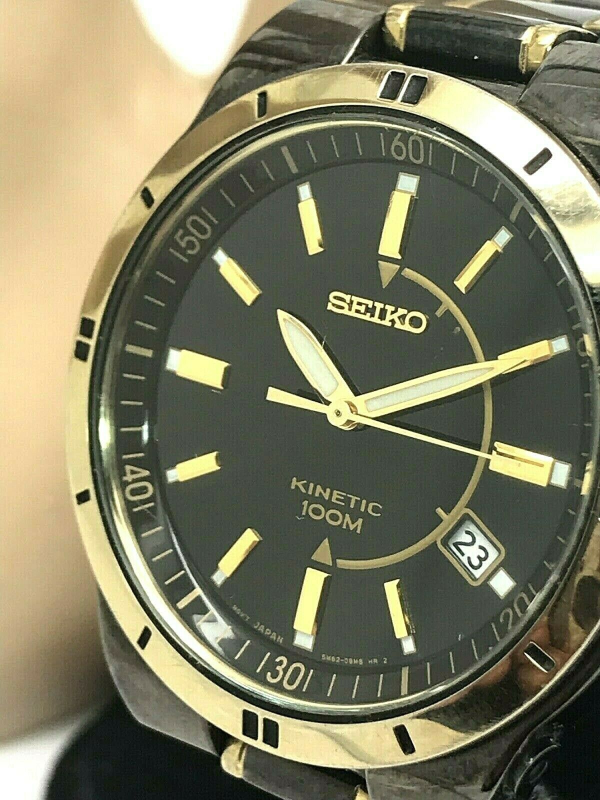 seiko kinetic black and gold