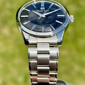 Grand Seiko Quartz SBGX321 Price as of February 2026 | WatchCharts
