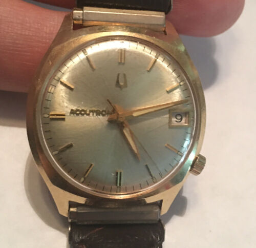 bulova accutron 14k gold watch