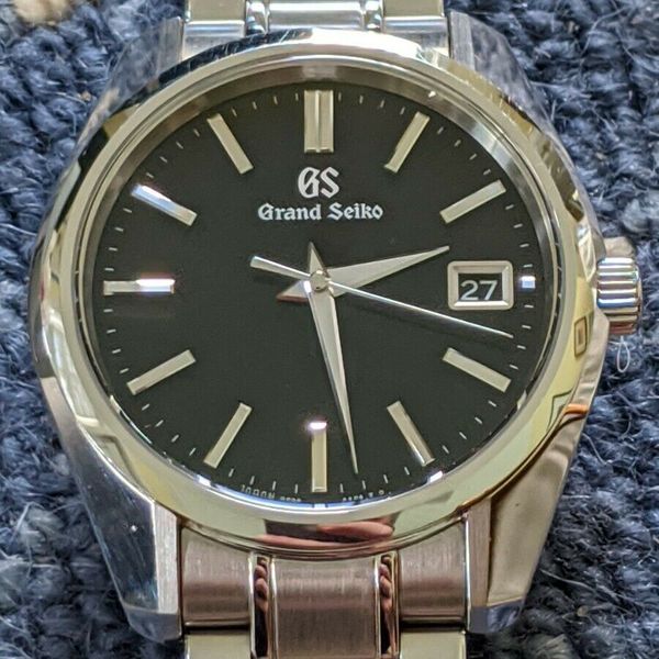 Grand Seiko SBGV207 Quartz Stainless Steel Men's Watch with Black Dial and  Date | WatchCharts