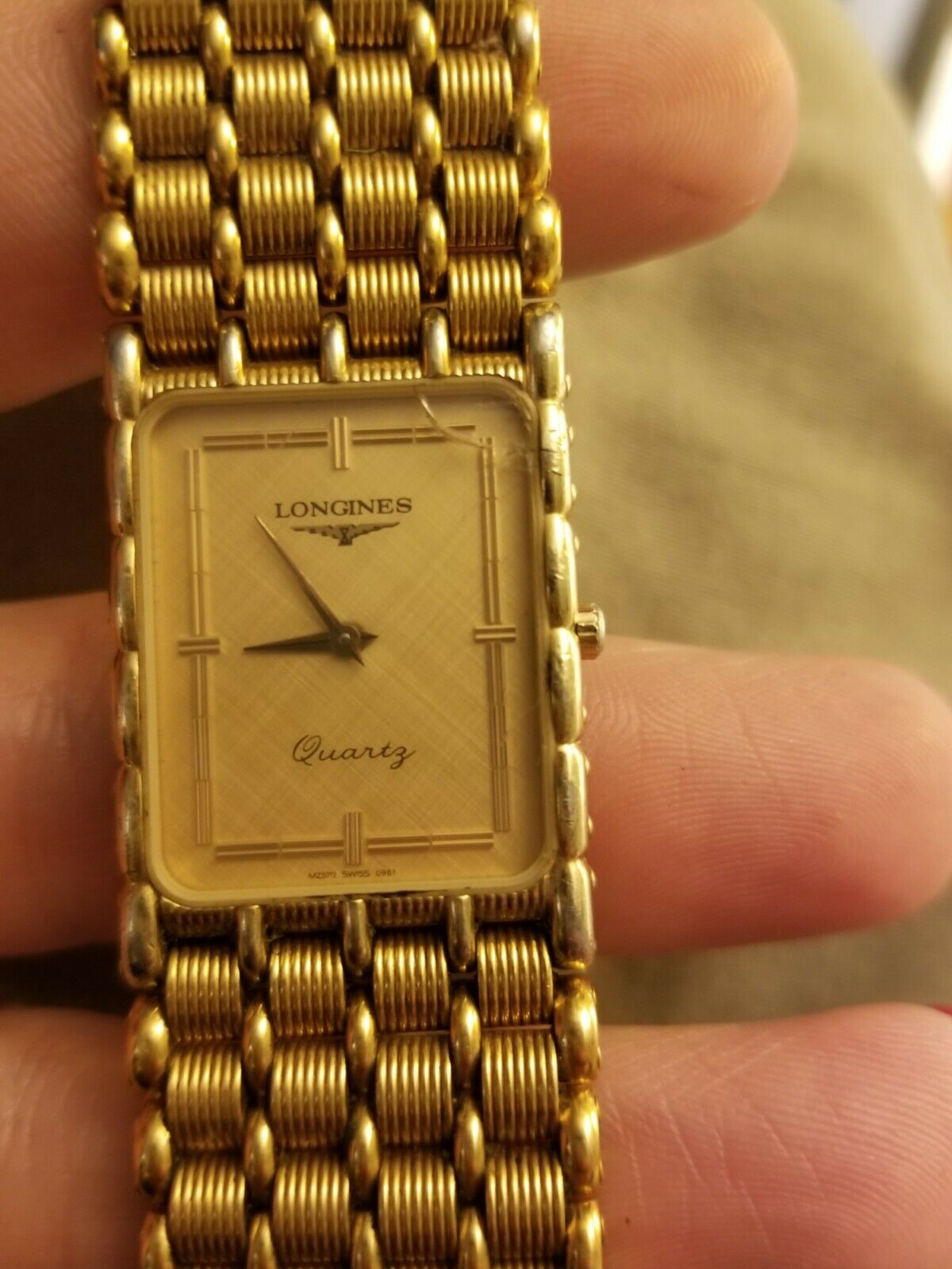 longines rectangular gold watch