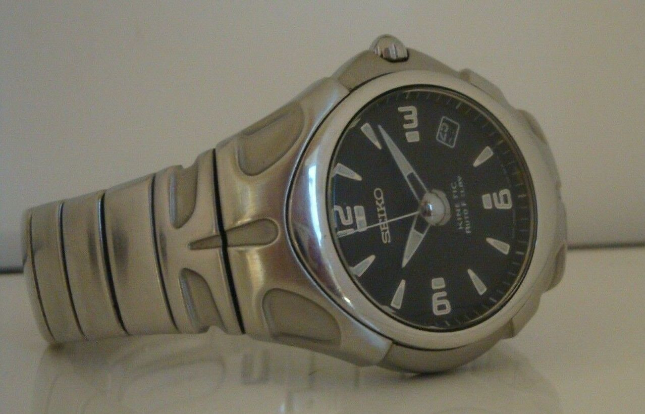 Seiko Kinetic Auto Relay. Gents steel model, black dial. 5J22-0A10. January  1999 | WatchCharts