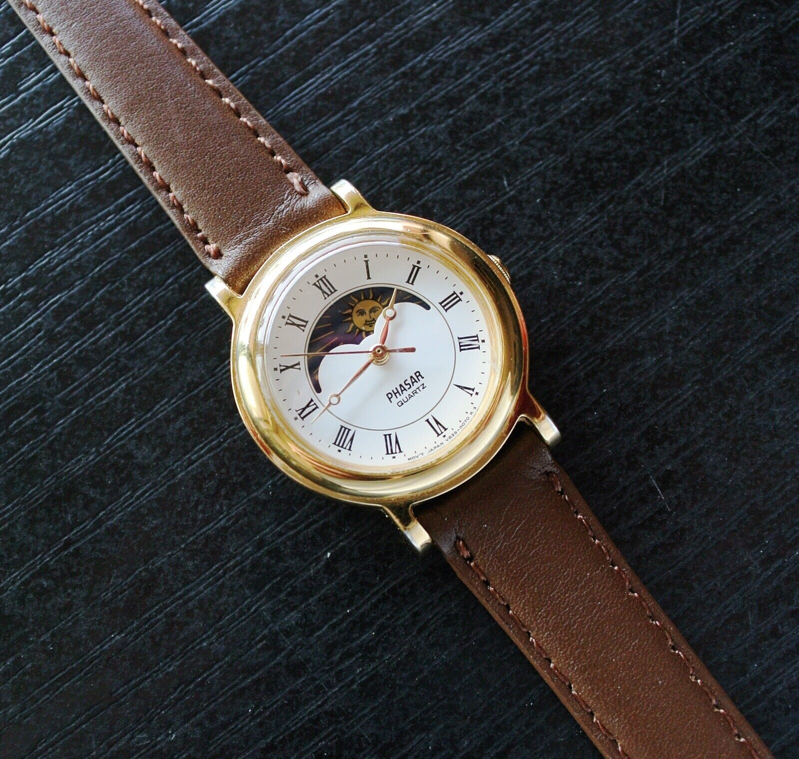 Phasar quartz gold watch hotsell