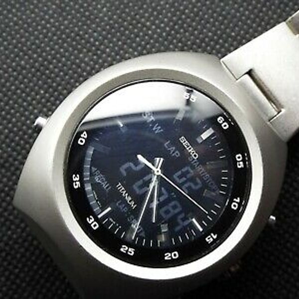 SEIKO VINTAGE DIGITAL WATCH FLOATING LCD H711-OA10 TITANIUM