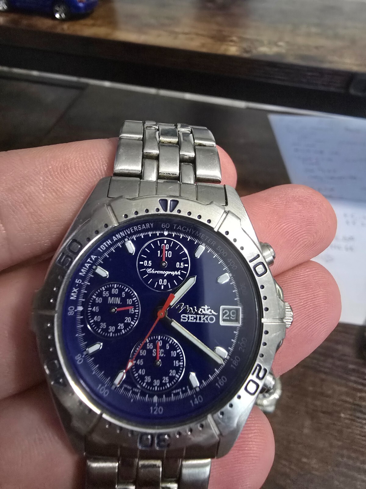 pair of mazda miata 10th anniversary seiko watches mens & womens