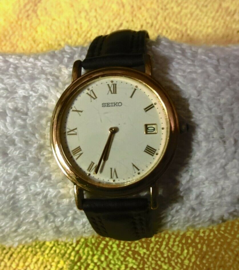 Vintage men's watch SEIKO 7N49-0050 Quartz water resistant Japan