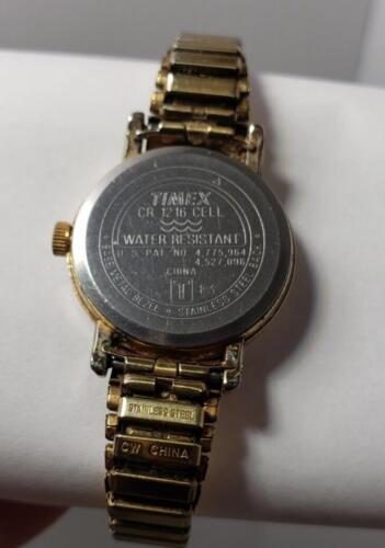 Timex Watch Water Resistant CR 1216 Cell Stanless Steel Back Gold