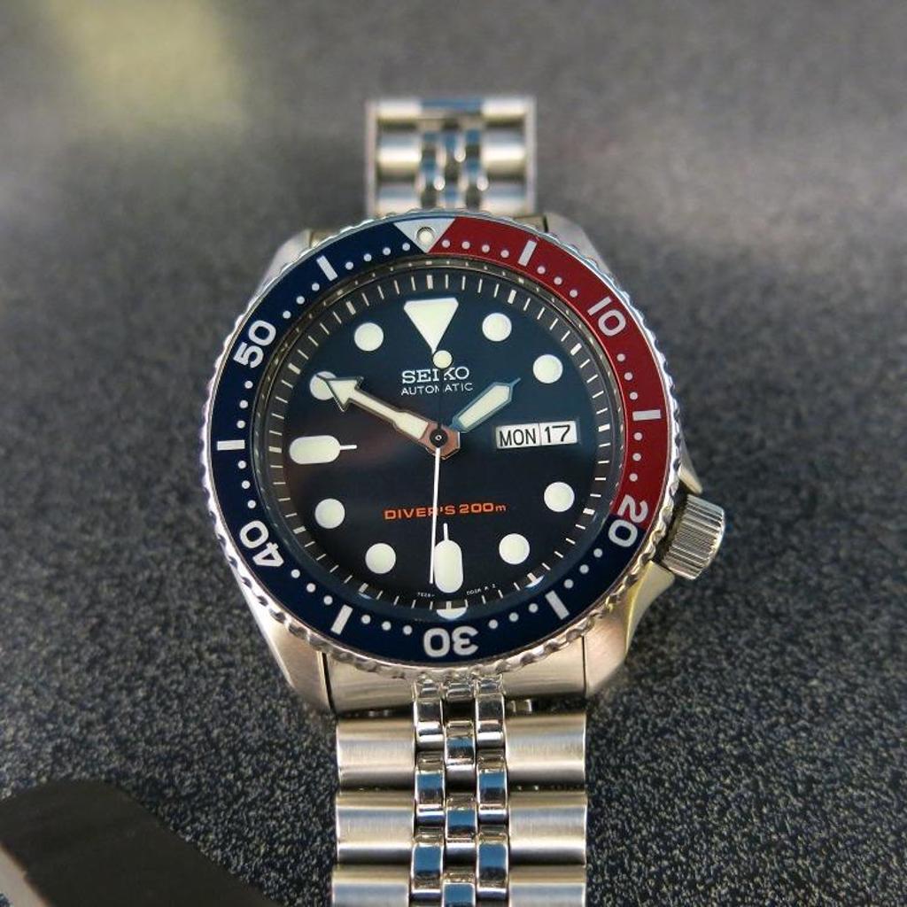 For sale or trade Seiko SKX009 with original Jubilee bracelet and full kit  | WatchCharts