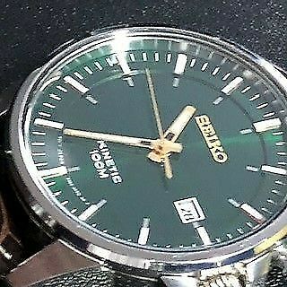 desmayarse ansiedad radical Seiko SKA753P1 Men's Kinetic Watch - Green Dial | WatchCharts