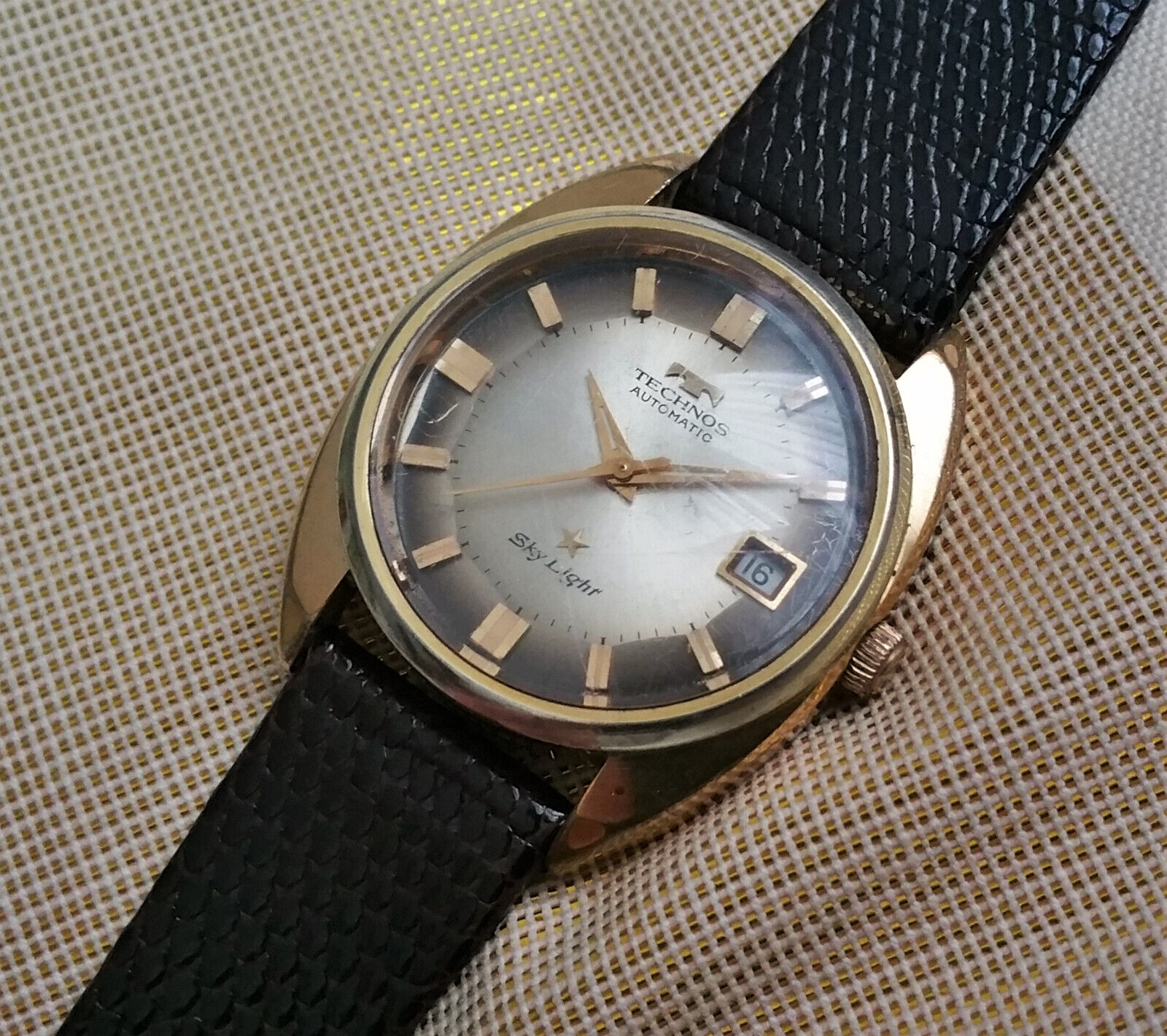 Vintage Swiss Technos Sky Light automatic watch, gold plated, pie