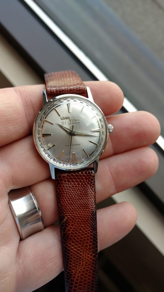 Lord elgin watch value hot sale