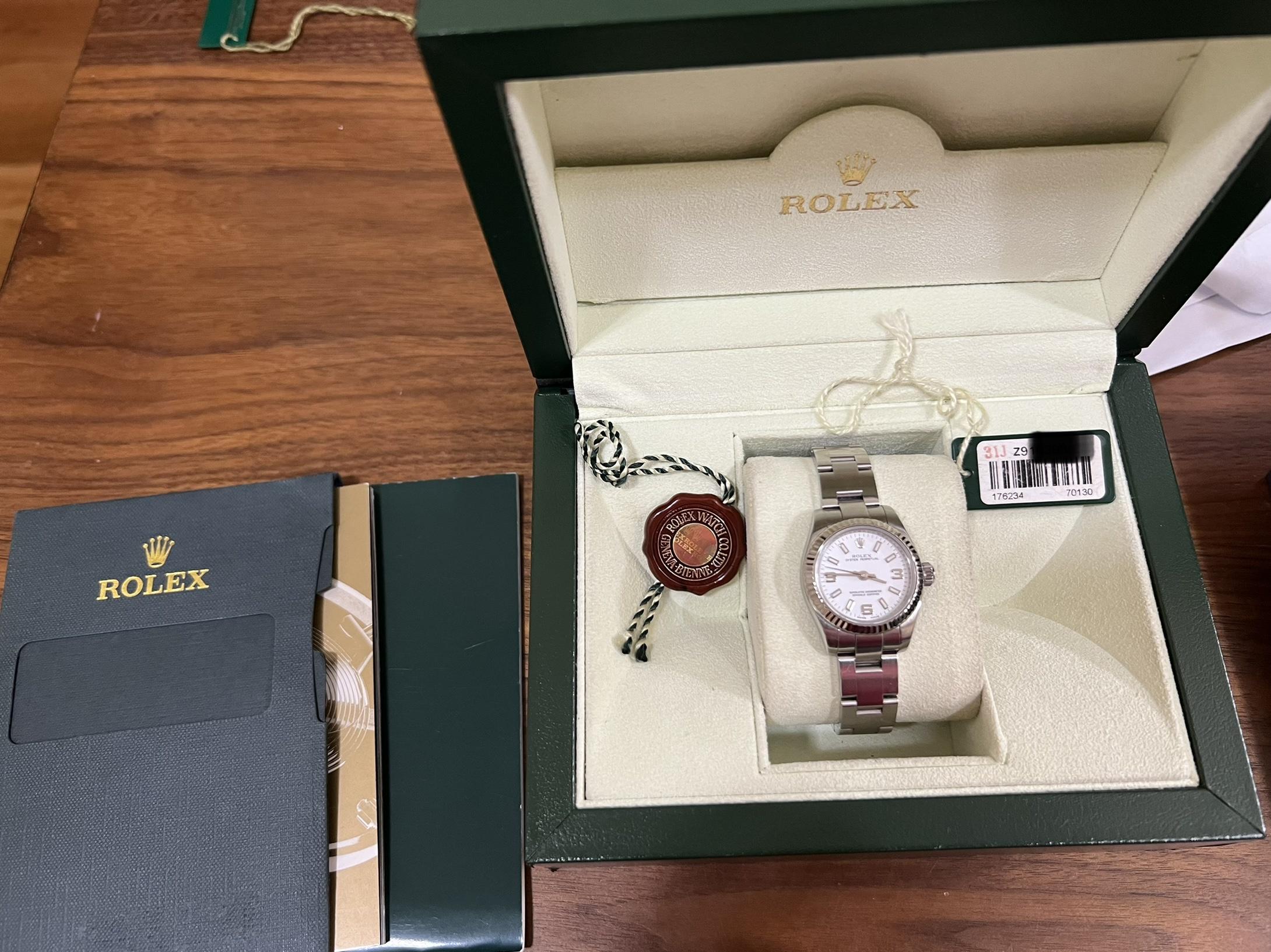 Rolex serial outlet or6j2001 price