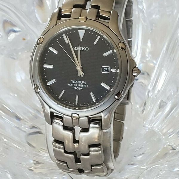SEIKO Titanium 50M BLACK DIAL DATE Quartz Watch 7N32-0091 | WatchCharts ...