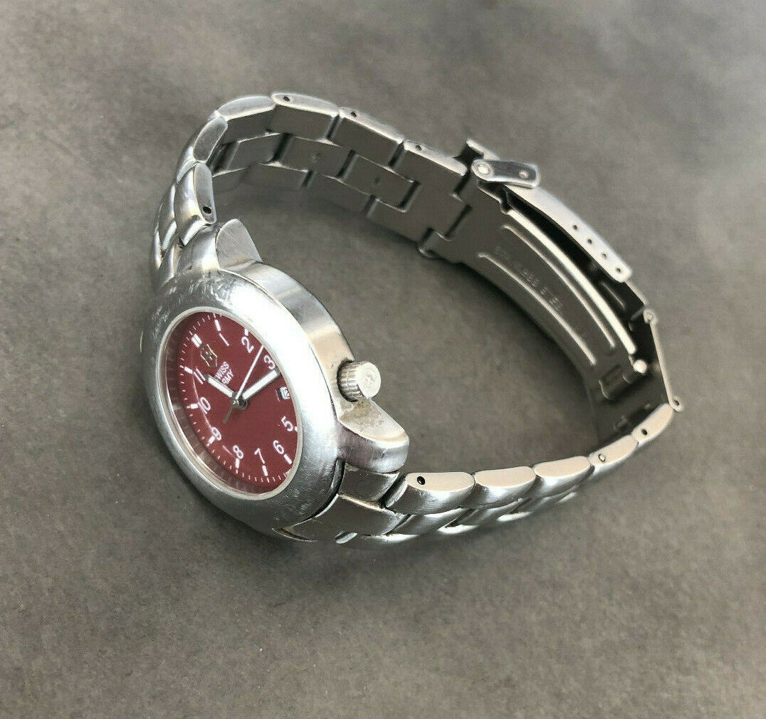 Swiss army watch red on sale face