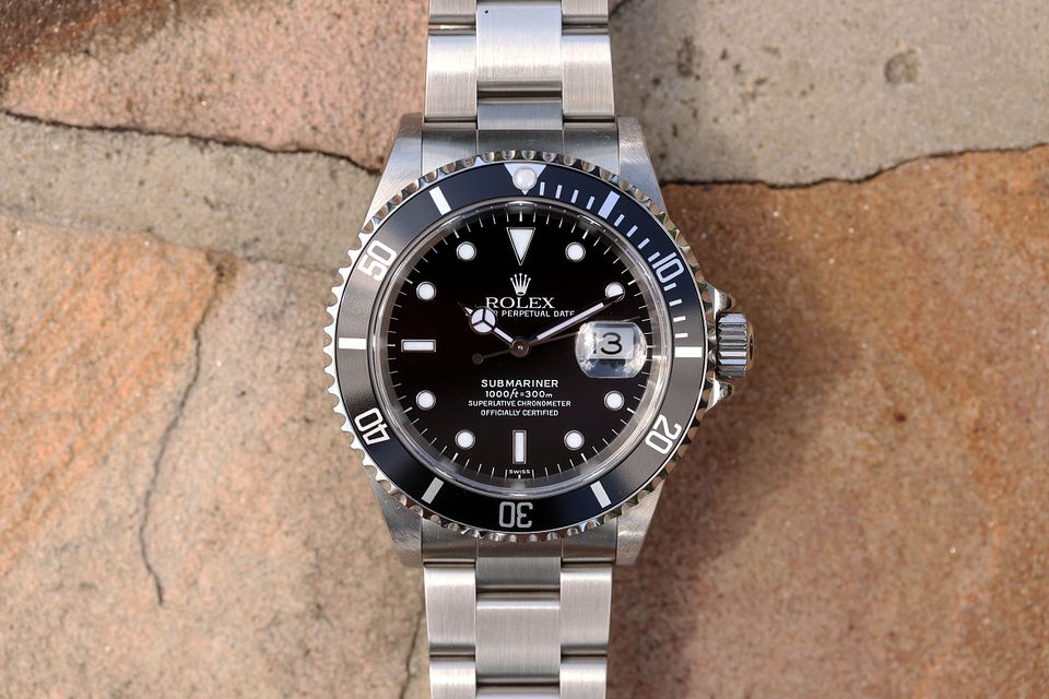 Rolex sub hotsell 16610 tc