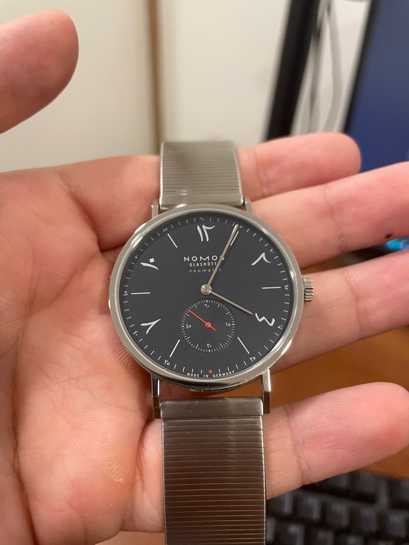 Nomos red clearance dot