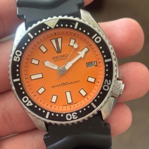 Citizen Spalding 1408-394844 Quartz Orange Dial Men's 100m
