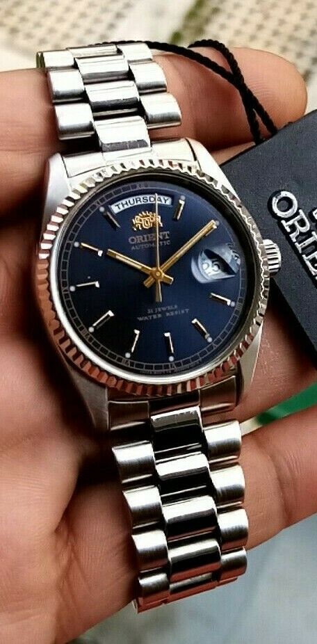 Orient President Day Date 46E Discon. DD with Fluted Bezel 2EV03001DY Full  Set | WatchCharts Marketplace