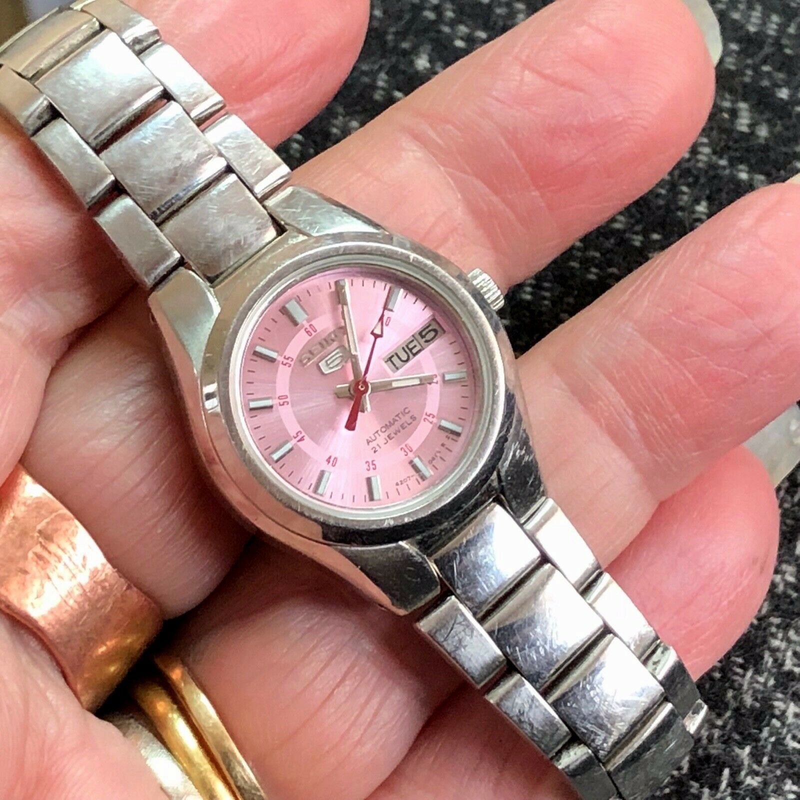 Seiko 5 Automatic 21J Jewel Stainless Steel Pink Face iridescent Woman's  Watch | WatchCharts