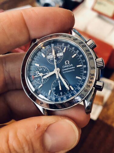 Omega speedmaster triple date clearance blue dial