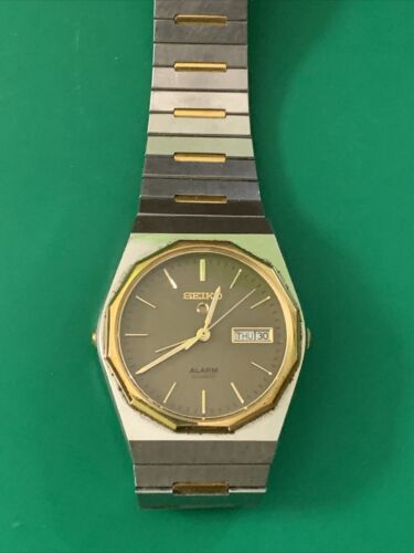 Vintage Unique Seiko # 5C23-7019 Dual Crown Alarm Quartz Watch Day/Date  580207 | WatchCharts