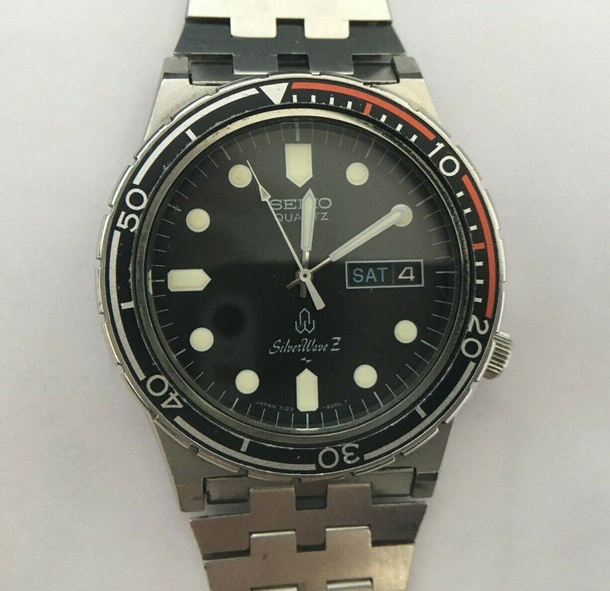 w237] SEIKO Diver Silver Wave Z 7123-8250 Quartz New battery Working VG |  WatchCharts Marketplace