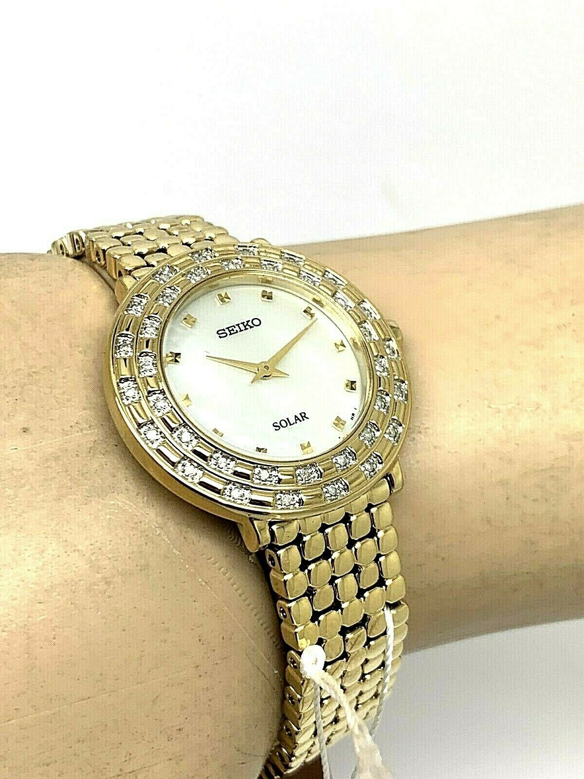 Seiko Women's Solar Gold Tone Stainless Steel shops Diamond Watch SUP374