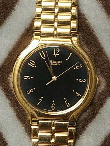 Vintage Men's Seiko v701-6j60 Sx Gold good