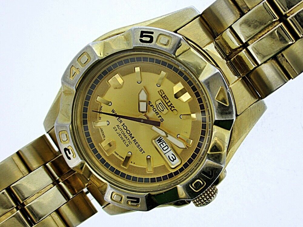 CLASSIC SEIKO 7S36 02L0 MENS SEE THRU AUTOMATIC DAY DATE GOLD